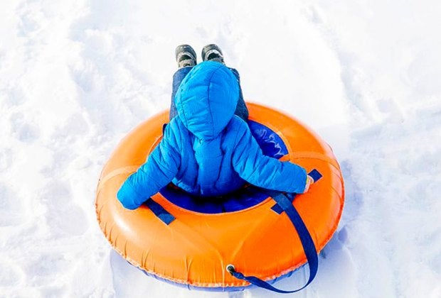 Snow tubing is a favorite winter activity in Chicago. Photo courtesy of Canva