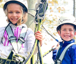 Fall day trips offer relaxation, natural beauty, or high-flying fun. Photo courtesy of Monkey Trunks Zipline and High Ropes Adventure