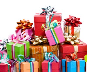 Wrap up tickets or gift certificates in a pretty box to delight kids on Christmas morning.