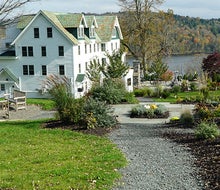 The historic Kenoza Hall is perched on a hillside, boasts lake-front views, and soon family-friendly bungalows. Photo by the author