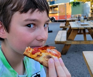 It doesn't get much better than a delicious slice of pizza! Photo courtesy of Stracci Pizza
