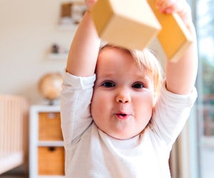 Walking, talking, grabbing, holding, smiling, laughing... it's all coming. But when? Photo by Tatiana Syrikova, via Pexels