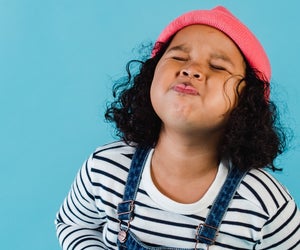 Photo of girl laughing by Amina Filkins via Pexels