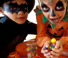 Got too much Halloween candy? We rounded up the best Halloween candy donation programs! Photo by Pixland via Canva