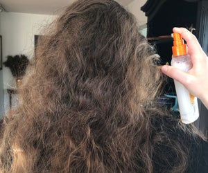 Leave-in conditioners make managing those epic knots so much easier. Photo by Meghan Rose