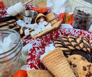 Dessert charcutterie boards, like this S'mores Board,  delight kids and parents alike.