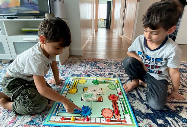 Kids playing Sorry! - not boring!