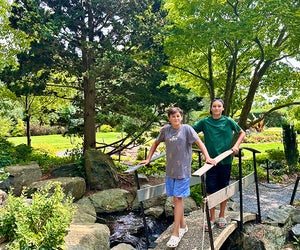 Winding paths, ponds, and streams line the lush grounds of Clark Botanic Gardens. 