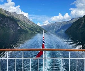 Take a scenic boat ride through the breathtaking fjords. 