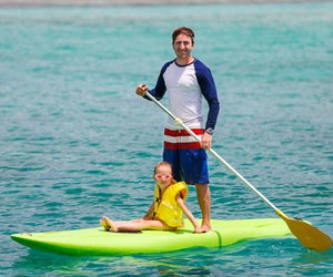 Take a paddleboard lesson. Photo via Bigstock