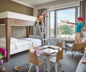 Try the indoor s'mores kit and the  Rocky-style robes for kids at the Logan Hotel.