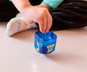 There are so many fun ways to incorporate dreidels into your Hanukkah festivities.