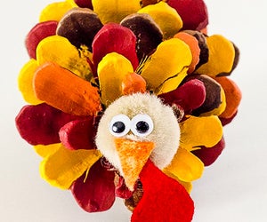 Make an easy and adorable pine cone turkey. Photo courtesy of  the website Live Craft Eat