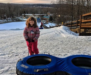 Snow tubing is one of many fun winter activities to enjoy at the all-seasons Rocking Horse Ranch with kids. 