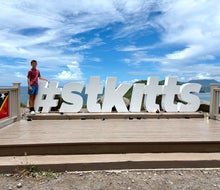 Your family and followers will know exactly where you're vacationing when you send them a pic at the St. Kitts sign at the Timothy Hill Overlook.