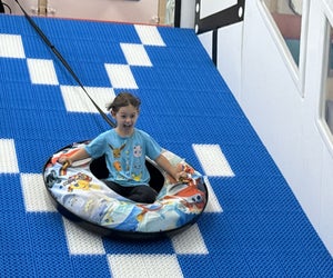 Kids will burn off all their energy running, jumping, and sliding through the Jetsetters Kids Club. Photo by Gina Massaro